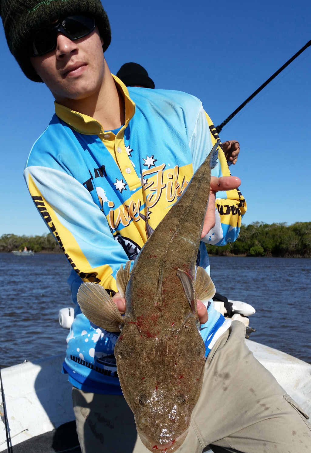 Jack Sutton with a fine flatty caught up the creek. Jack Sutton with a fine flatty caught up the creek.